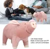 A child and a dog are on a bed, with a plush pig toy in the foreground. Podgląd zdjęcia produktu