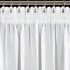 A close-up view of white sheer curtains hanging from a rod. Náhľad obrázku produktu