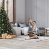 A mother and daughter are playing on the floor in a bedroom decorated for Christmas. Náhľad obrázku produktu