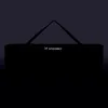 A black scooter bag with a logo is shown against a dark background. Produktbild-Vorschau
