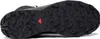 The image shows the sole of a black Salomon hiking boot. Voir les images du produit