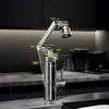 A modern kitchen faucet with a digital display, shown on a countertop with kitchen cabinets in the background. Produktbild-Vorschau