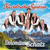 A group of men in traditional clothing are posing in front of a mountain landscape. Voir les images du produit