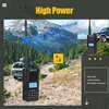 Two walkie-talkies are shown in a natural outdoor setting with mountains and trees in the background. One walkie-talkie is in the foreground, and another is in the mid-ground. A map icon with a dotted line connecting two points is also visible. Produktbild-Vorschau