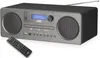 A JVC mini-tower stereo system with a remote control in front of it, set against a white background. Anteprima dell’immagine prodotto