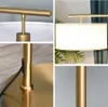 A collage of four close-up images of a gold floor lamp with a white lampshade. Náhľad obrázku produktu
