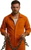 A man in an orange jumpsuit holds a heavy chain. Anteprima dell’immagine prodotto