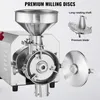 A stainless steel grain mill with attached components labeled for clarity. Produktbild-Vorschau