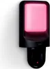 A black WiZ outdoor wall light with a pink illuminated panel is mounted on a white wall. Produktbild-Vorschau