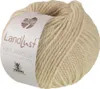 A ball of beige yarn with a label. Produktbild-Vorschau