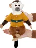 A plush toy monkey wearing a sweater is held by two hands. Produktbild-Vorschau