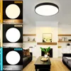 A collage showing a ceiling light in a room and different color temperature examples of the light. Produktbild-Vorschau