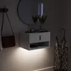 SoBuy Nachttisch FBT176-E-W mit LED-Unterleuchte im dunklen Raum neben Regenschirmständer Produktbild-Vorschau