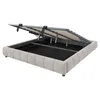 A beige upholstered bed frame with its mattress support mechanism open, revealing the storage space underneath. Podgląd zdjęcia produktu
