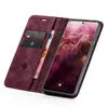 A burgundy flip-case wallet for a Google Pixel 7 Pro phone, shown open with the phone inside and cards and cash in the wallet section. Produktbild-Vorschau