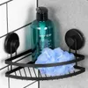 A black metal corner shower shelf with a green bottle of body soap and a blue loofah. Náhled obrázku produktu