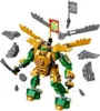 A green and gold robot toy with various accessories scattered around it. Anteprima dell’immagine prodotto