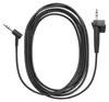 A black audio cable coiled on a white background. Produktbild-Vorschau
