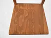 Close-up of a wooden chair seat with visible wood grain. Produktbild-Vorschau