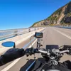 Riding a motorcycle on a scenic road with a GoPro camera mounted on the handlebars. Anteprima dell’immagine prodotto