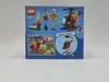 The back of a LEGO City Fire Helicopter set box, showing the contents and build instructions. Voir les images du produit