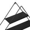 A close-up view of a black metal wall shelf with two shelves, against a white background. Anteprima dell’immagine prodotto