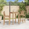 A patio scene with a bar table and two bar stools made of bamboo, set against a wooden fence and greenery. Produktbild-Vorschau