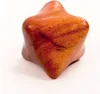 A single wooden massage tool with a star-like shape on a white background. Produktbild-Vorschau