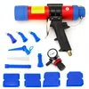 A collection of pneumatic caulking gun parts and accessories laid out on a white background. Podgląd zdjęcia produktu