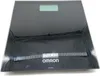 A black digital bathroom scale with a reflective surface. Podgląd zdjęcia produktu