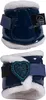 Two navy blue boots with white fur trim, one with a black and blue strap and a teal heart decoration, and the other with a black label with a horse logo and text. Náhľad obrázku produktu