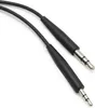 Two black audio cables with silver connectors on a white background. Voir les images du produit