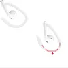 Two white silicone ear hooks designed to attach to earbuds, with one showing red arrows indicating flexibility. Produktbild-Vorschau