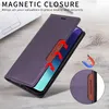 A purple leather flip wallet phone case is shown on a wooden surface next to a laptop. Produktbild-Vorschau