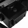A close-up view of a black mechanical component, possibly part of a larger device. Anteprima dell’immagine prodotto