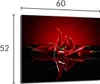 A product image showing red chili peppers on a reflective black surface with a red background, with dimensions indicated. Náhled obrázku produktu