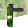 A smartphone with a telephoto lens attached, focused on a dewdrop on a blade of grass. Náhled obrázku produktu