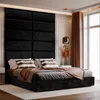 A bedroom scene featuring a bed with a black upholstered headboard, pillows, and a throw blanket. Anteprima dell’immagine prodotto