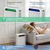 A woman reading a book on a couch with a cat, next to an air purifier. Produktbild-Vorschau