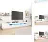 A collage of images showing a white TV stand with LED lights, a television, and decorative items. Náhled obrázku produktu