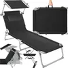 A black foldable garden lounger with a sunshade is shown in a studio setting with a white background. The lounger is shown in its unfolded state, and also in a folded state being held by a hand. Smaller inset images show details of the lounger's adjustabil Náhled obrázku produktu