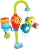 A colorful bath toy with a faucet-like spout, stacking cups, and spinning gears. Podgląd zdjęcia produktu