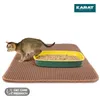 A cat is stepping into a litter box placed on a litter mat. Produktbild-Vorschau