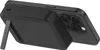A black iPhone with a black battery pack attached, shown from a side angle with the battery pack's kickstand extended. Voir les images du produit