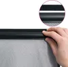 A hand is shown attaching a black mesh curtain to a frame, likely for insect protection. Anteprima dell’immagine prodotto