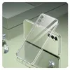 A clear phone case is shown in a studio-like setting with reflective surfaces and decorative diamonds. Produktbild-Vorschau