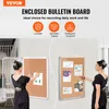 Two women interacting with bulletin boards on a wall. Anteprima dell’immagine prodotto