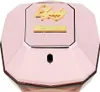 A close-up, top-down view of a pink, faceted perfume bottle with gold lettering. Podgląd zdjęcia produktu