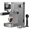 A silver and black espresso machine is shown with a glass of espresso being brewed. Produktbild-Vorschau