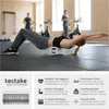 A woman is using a foam roller in a gym setting, with other exercise equipment visible in the background. The bottom part of the image contains product information and graphics. Produktbild-Vorschau
